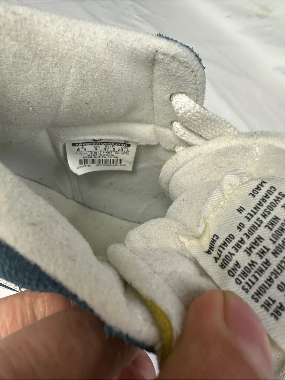 Nike Blue High-Top Sneakers with White Swoosh